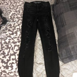 black ripped high rise jeggings